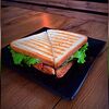 Фото к позиции меню Сэндвич с семгой и огурцом