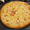 Фото к позиции меню Осетинский пирог с сыром (Цæхараджын)