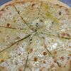 Фото к позиции меню Пирог осетинский с сыром, творогом и зелёным луком
