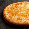 Фото к позиции меню Четыре сыра 23см пицца