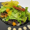 Фото к позиции меню Теплый салат с печенью цыплёнка, грибами, тыквой, каштанами и ореховым соусом