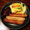 Фото к позиции меню Колбаски гриль по-немецки с картофелем по-деревенски и соусом BBQ