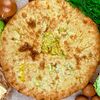 Фото к позиции меню Осетинский пирог с капустой и сыром
