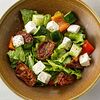Фото к позиции меню Греческий салат с вялеными томатами