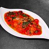 Фото к позиции меню Филе дорадо в соусе из томатов, шпината и таджасских оливок