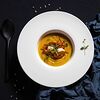 Фото к позиции меню Тыквенный крем-суп с креветками и пепперони