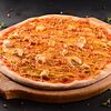 Фото к позиции меню Пиццетта с сочным филе курочки в соусе карри