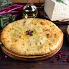 Фото к позиции меню Пирог с сыром и листьями свеклы