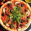 Фото к позиции меню Пицца с вялеными томатами и шампиньонами