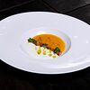 Фото к позиции меню Крем-суп из тыквы с тартаром из креветок