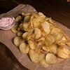 Фото к позиции меню Фирменные чипсы из деревенской картошечки