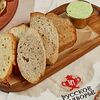 Фото к позиции меню Русский хлеб с чесночным маслом