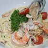 Фото к позиции меню Спагетти с морепродуктами в сливочном соусе