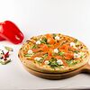 Фото к позиции меню Пицца со слабосоленым лососем и рукколой