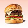Фото к позиции меню Бри-бургер с котлетой из говядины, карамелизированным луком и домашним трюфельным майонезом