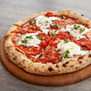 Фото к позиции меню Неаполитанская Пицца с овощами и страчателлой