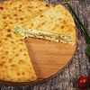 Фото к позиции меню Пирог с сыром и зеленым луком